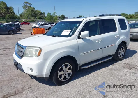 2010 Honda Pilot Touring из США, поврежденный, VIN 5FNYF4H99AB032377